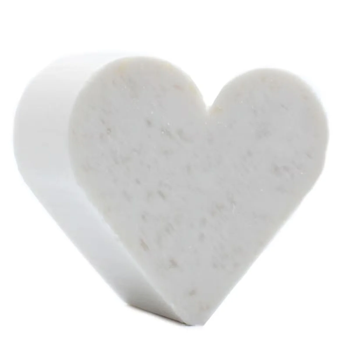 Heart-shaped coconut bath soap on a white background