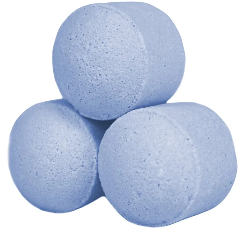 Compact box of chill pills mini bath bombs in bergamot & lavender, featuring a single lavender bath bomb inside.
