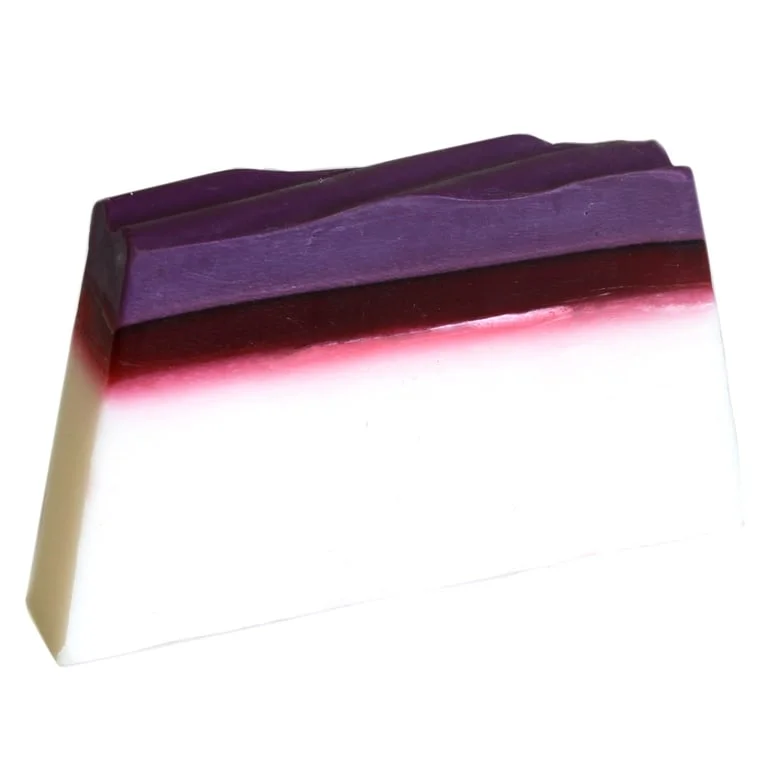 Tropical Paradise mangosteen soap loaf, sleek brown block with subtle green accents