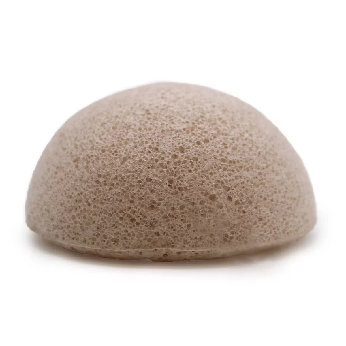 Natural konjac sponge in use for a konjac sponge bath.