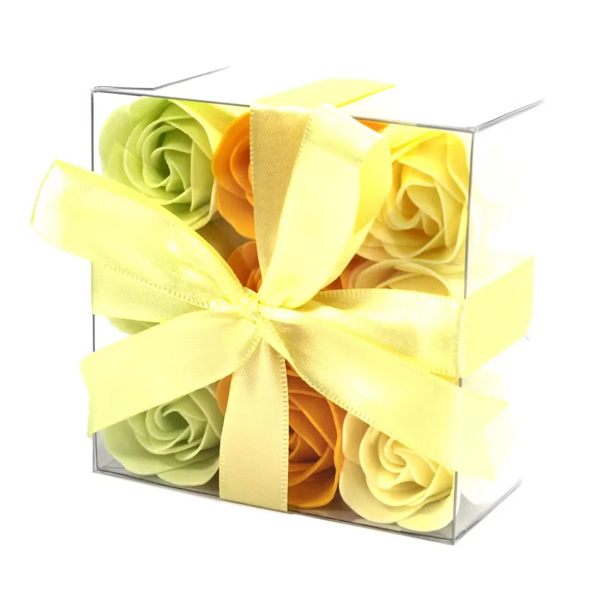 Nine hand‑crafted spring soap flowers shaped like roses arranged on a flat surface