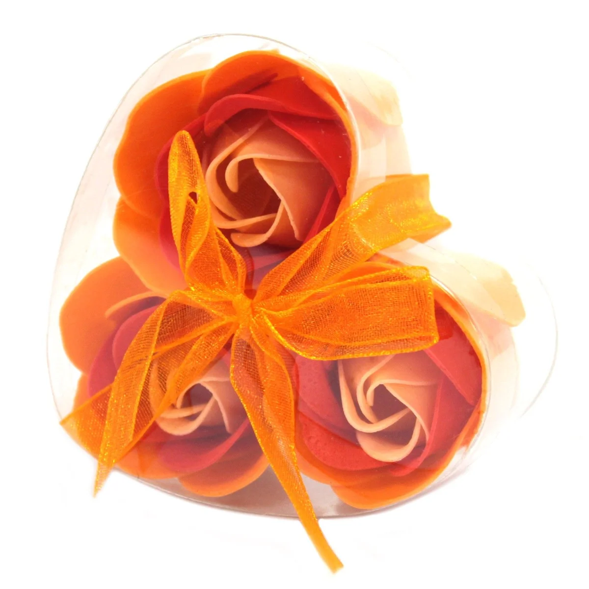 Three peach rose soap flowers in a compact heart‑shaped box, ready for a fresh, fragrant gift