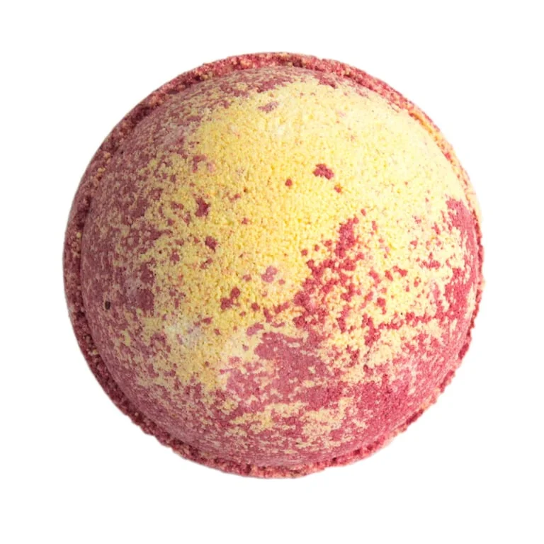 Three Piña Colada bath bombs displayed together.
