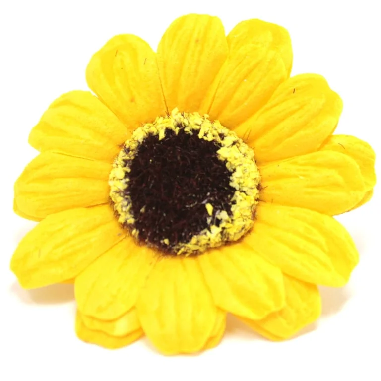 Yellow soap flower shaped like a small sunflower, crafted from soap.