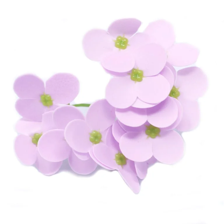 Lavender soap flower shaped like a hyacinth bean, richly fragrant and visually delicate.