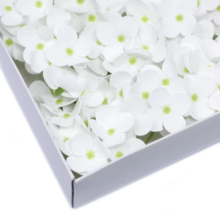 White hyacinth bean soap flower, crafted from soap, shaped like a flower.
