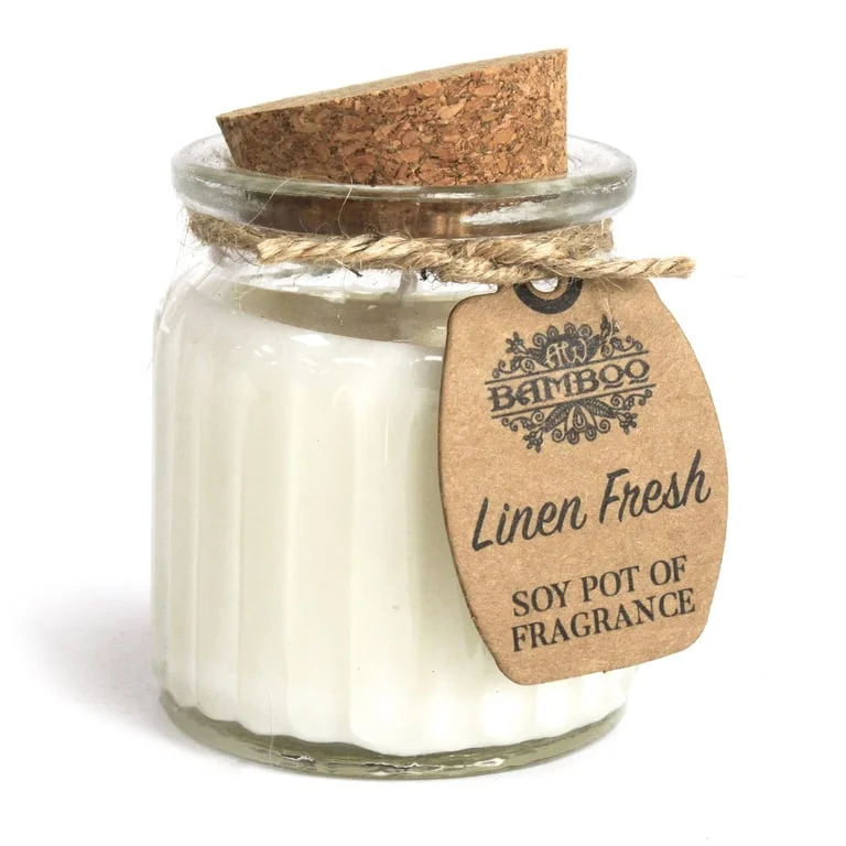 Portrait of a linen fresh soy candle in a pot