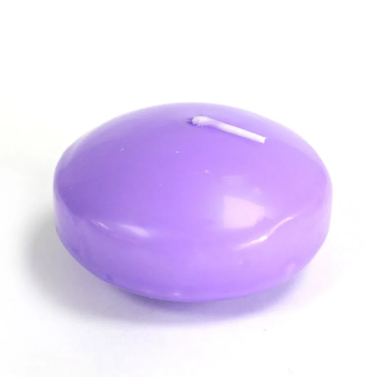 Large floating candle in lilac, floating on water, subtle light glow