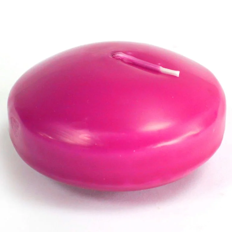 Lavender scented large floating candle in clear glass, pillowy wax center floating on water.
