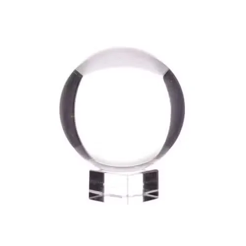 Small crystal ornament on stand, 30mm diameter ball shown under studio lights