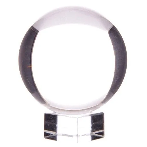 Crystal ball on a crystal ball stand, 150mm tall, shown in a clear display.