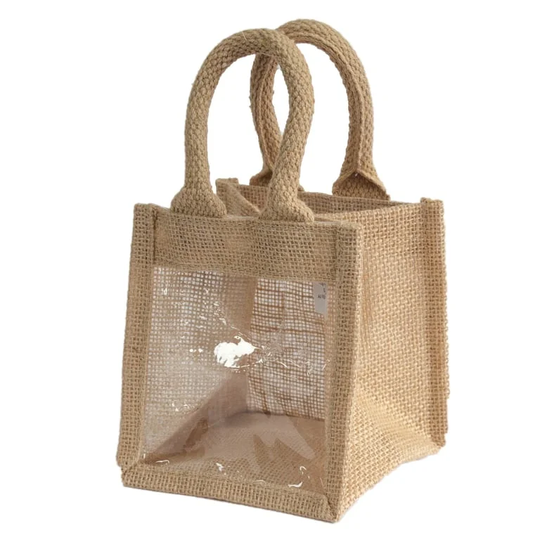 12cm jar with front window sitting in a gift bag, showing compact 12x12x13cm packaging