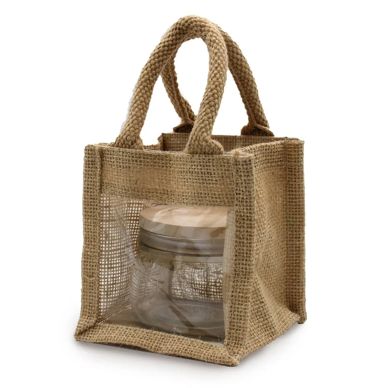 Compact window jar gift displayed inside a matching gift bag