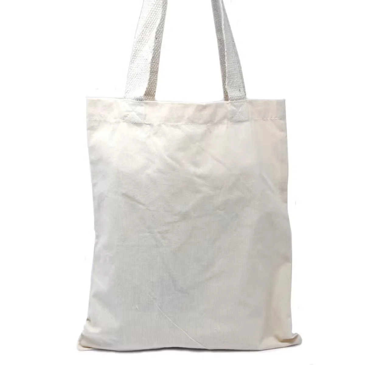 Natural cotton bag, 6oz, 35x30cm, folded flat with visible label
