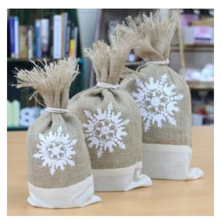 Three white Danish pouch set featuring snowflake pattern