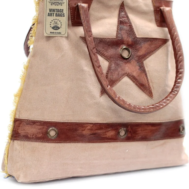 vintage handbag with a prominent big star emblem
