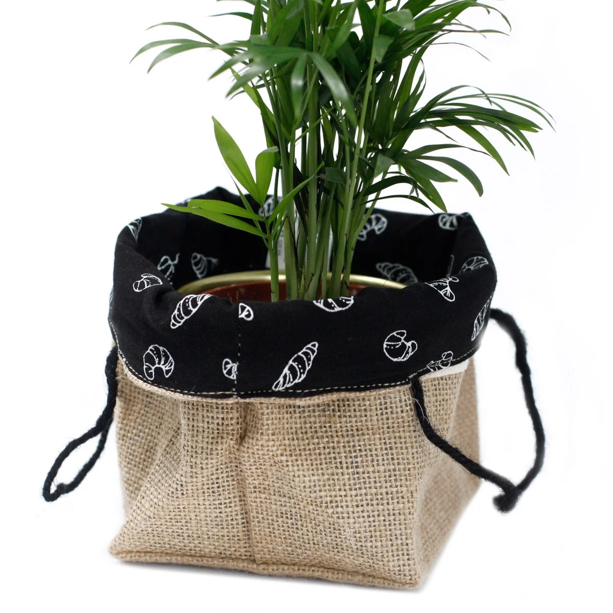 Medium natural jute gift bag with black lining, shown flat with visible jute weave.