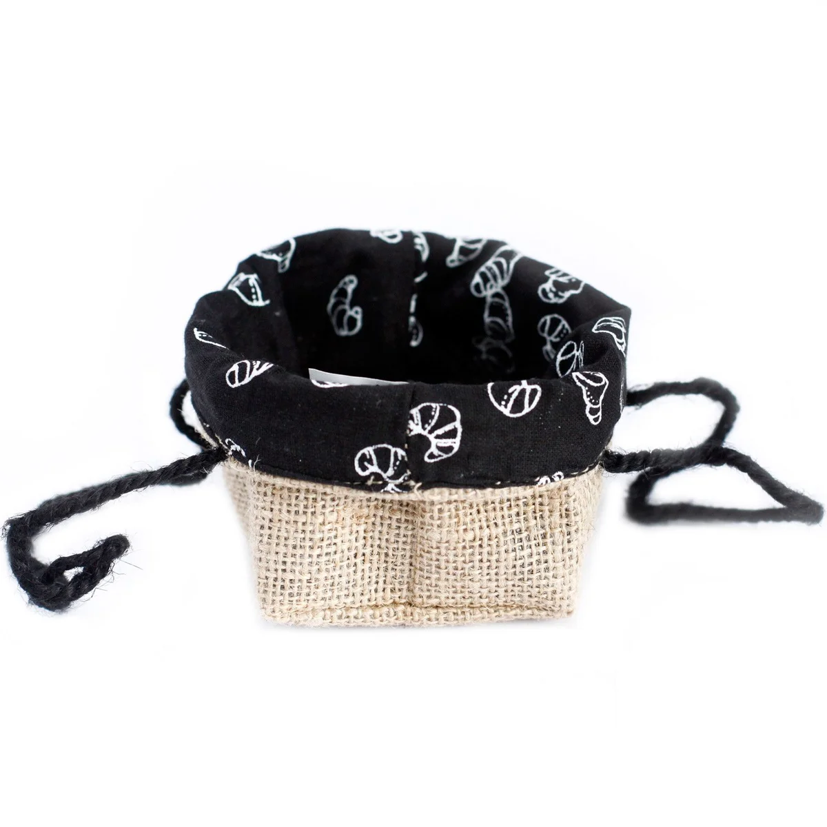 Small jute gift bag with black lining, brown natural jute exterior folded around, finished with twine.