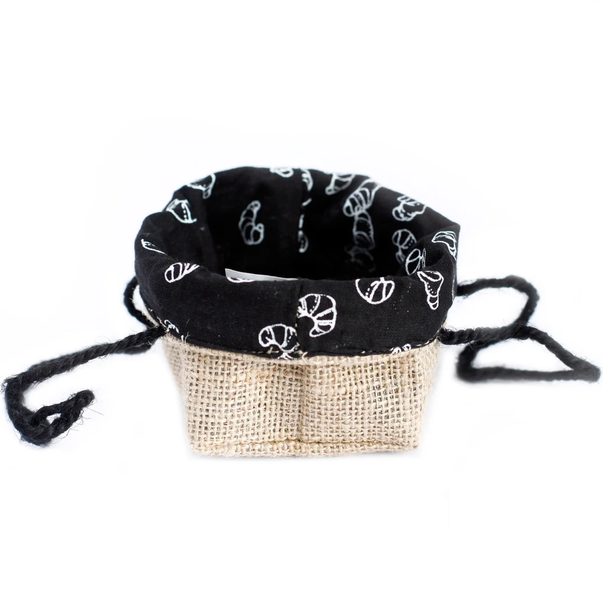 Small natural jute cotton gift bag with black lining.