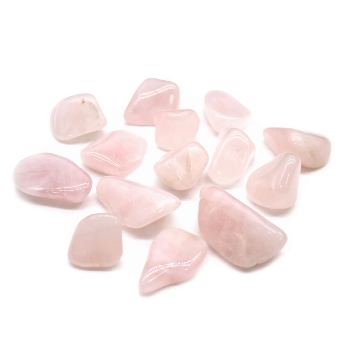 Compact pile of L Tumble Stones rose quartz stone with sparkling surface.