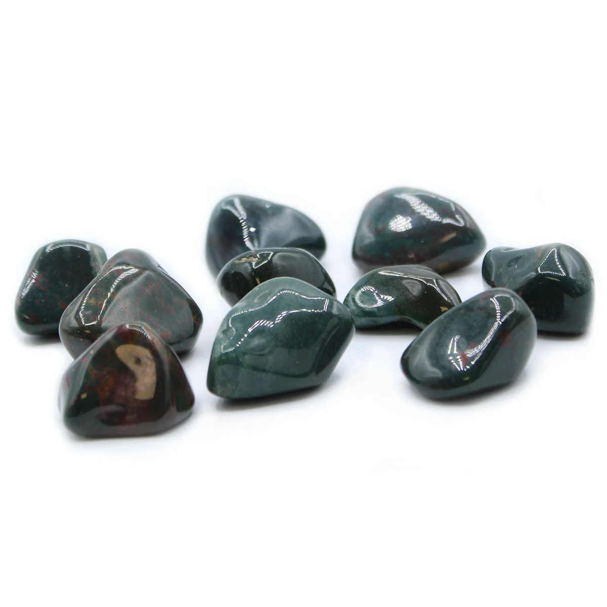 Polished bloodstone crystal tumble stones displayed together