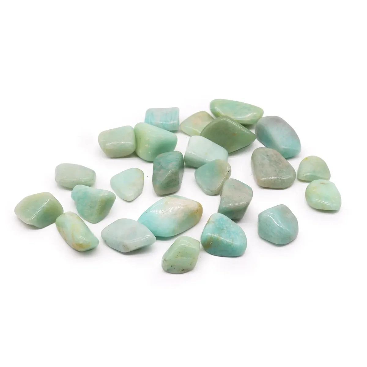 Large tumble stones in rich Amazonite colour displayed on neutral surface.