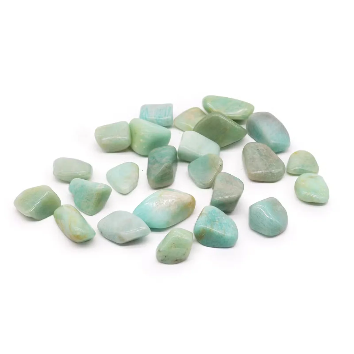 Natural crystal stones in earthy tones, featuring rounded Amazonite pieces.