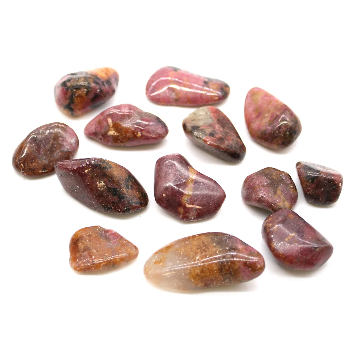 Rhodonite decorative crystal stones in a cluster, showing natural stone texture