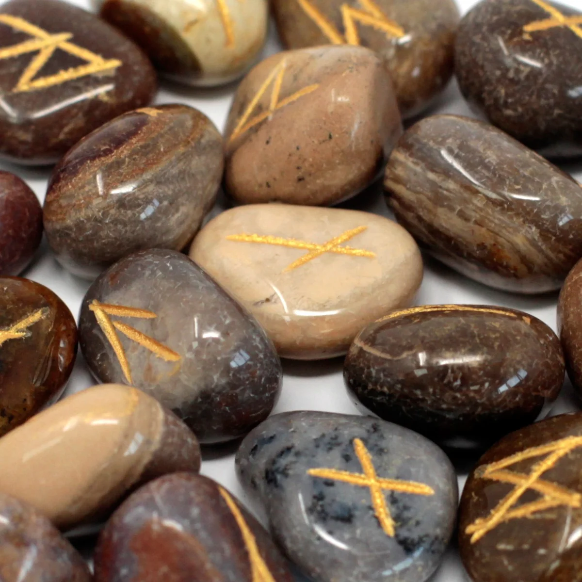 Runic stone pouch holding a set of fancy jasper runes.