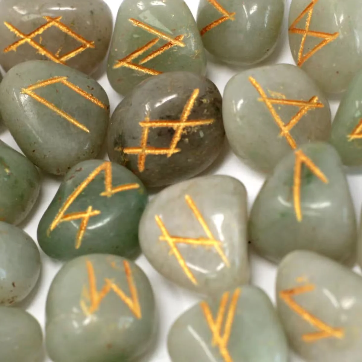 Green aventurine divination stone set presented in a pouch.