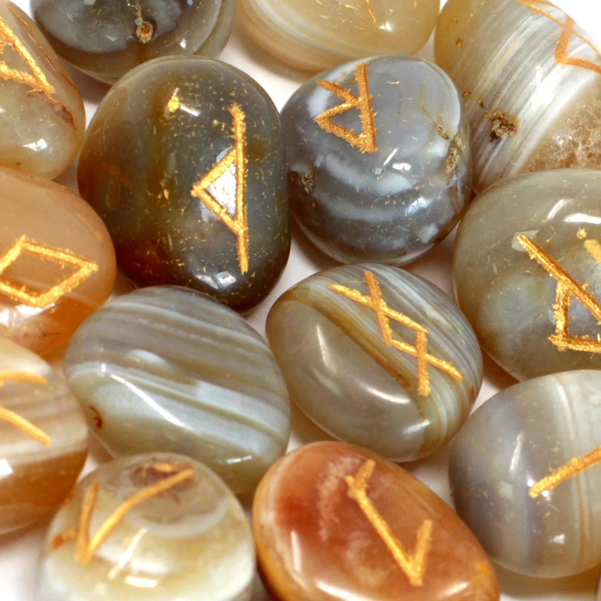 Rune stones pouch showcasing banded agate stones.