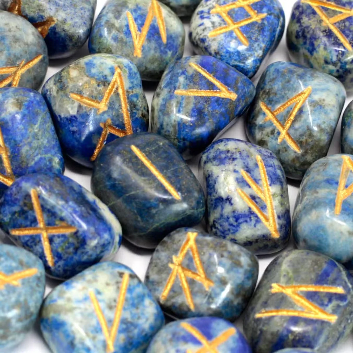 Compact set of lapis rune stones placed in a small pouch, representing rune stones uk collection.