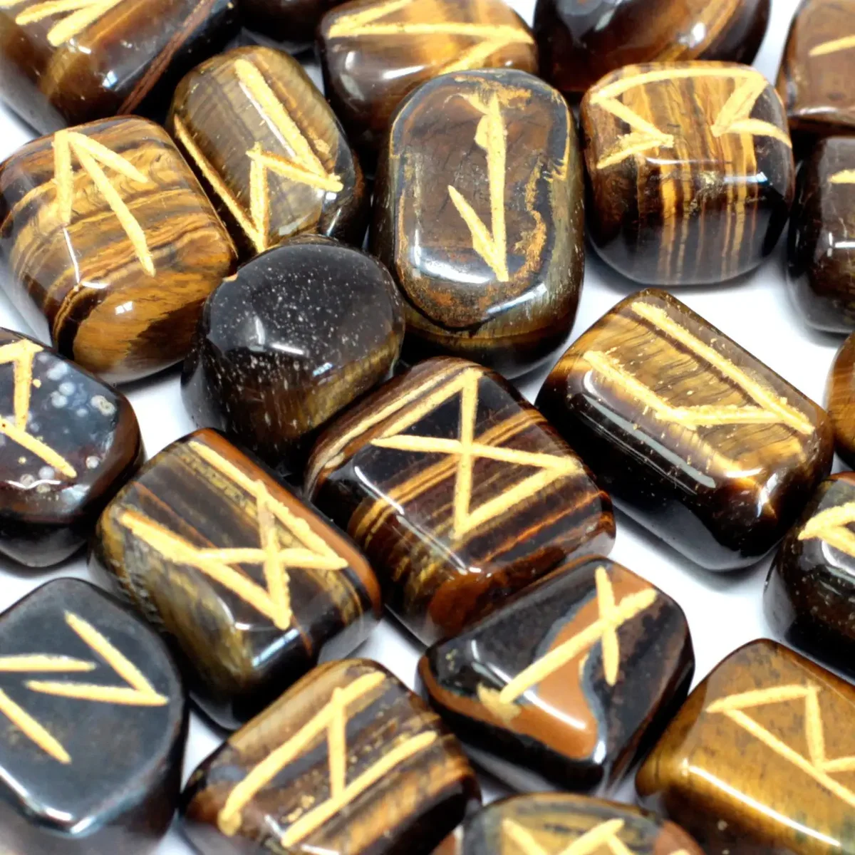 Runes stone set featuring tiger eye stones inside a pouch.