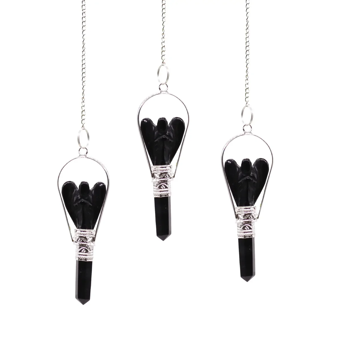 black agate pendulum with angel motif suspended on a metal ring