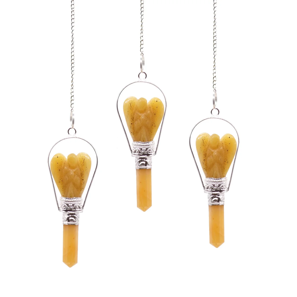 Yellow quartz angel ornament pendant hanging from a ring, suspended midair.
