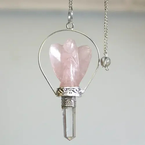 Rose quartz pendulum featuring an angel figure hung from a decorative halo ring.
