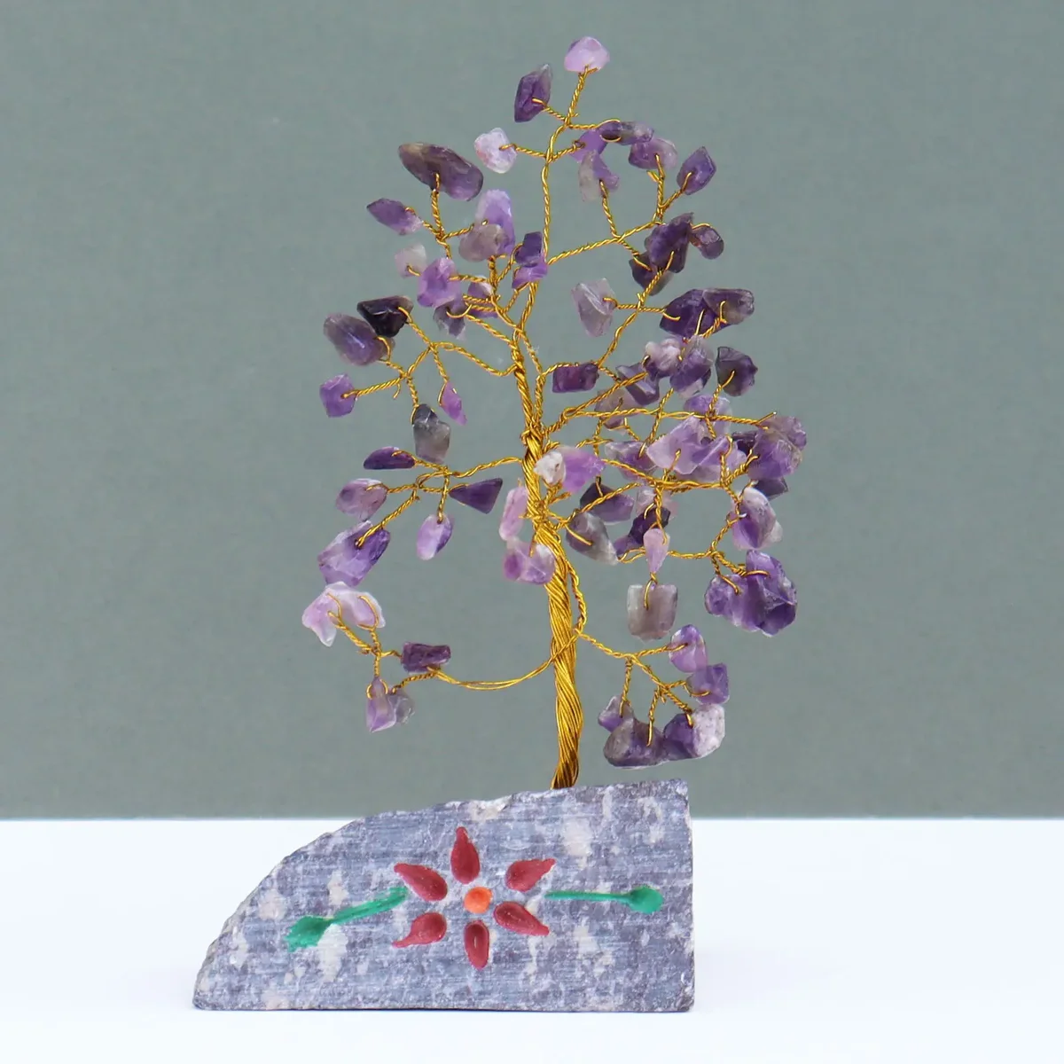 Amethyst decor showcasing 80 polished purple stones arranged in an attractive display.