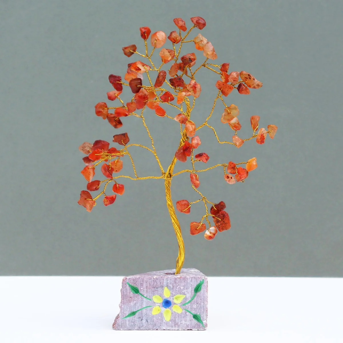 Elegant carnelian stone decor, 80‑stone piece shown in soft lighting.