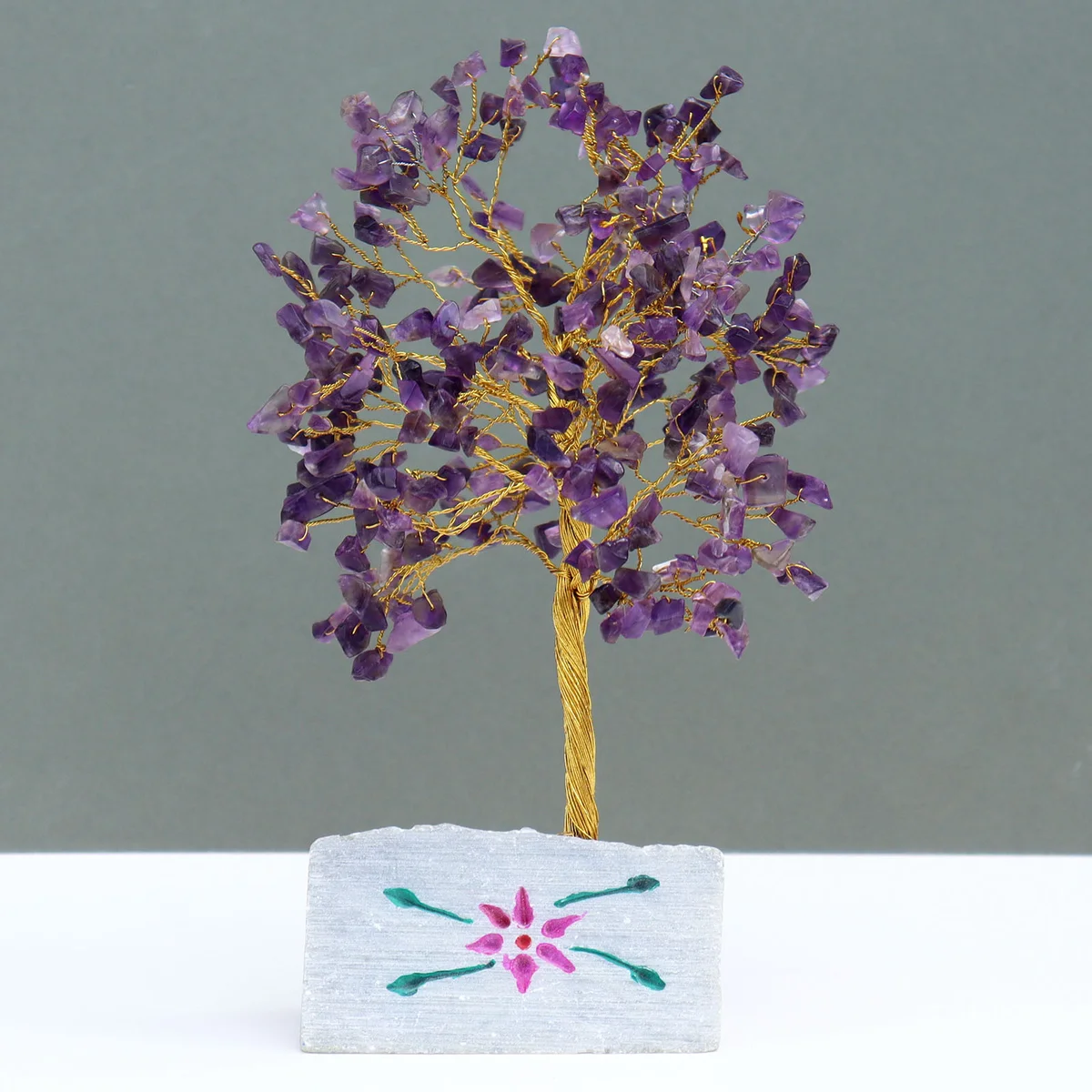 Amethyst stone ornament: polished purple amethyst with subtle facets and smooth edges.