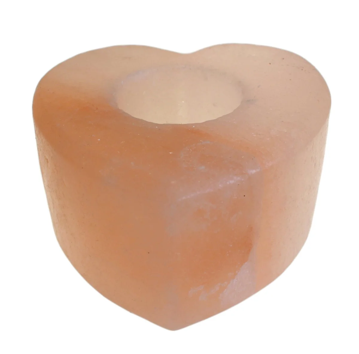 Salt candle holder shaped like a medium heart, ready to hold a candle.