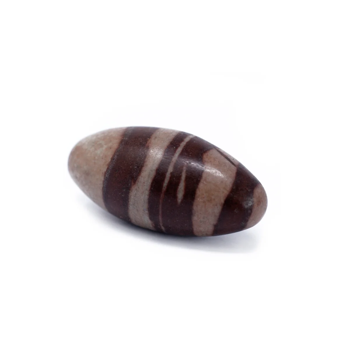 Three‑inch stone lingam centered on a neutral background, 1 stone in size.
