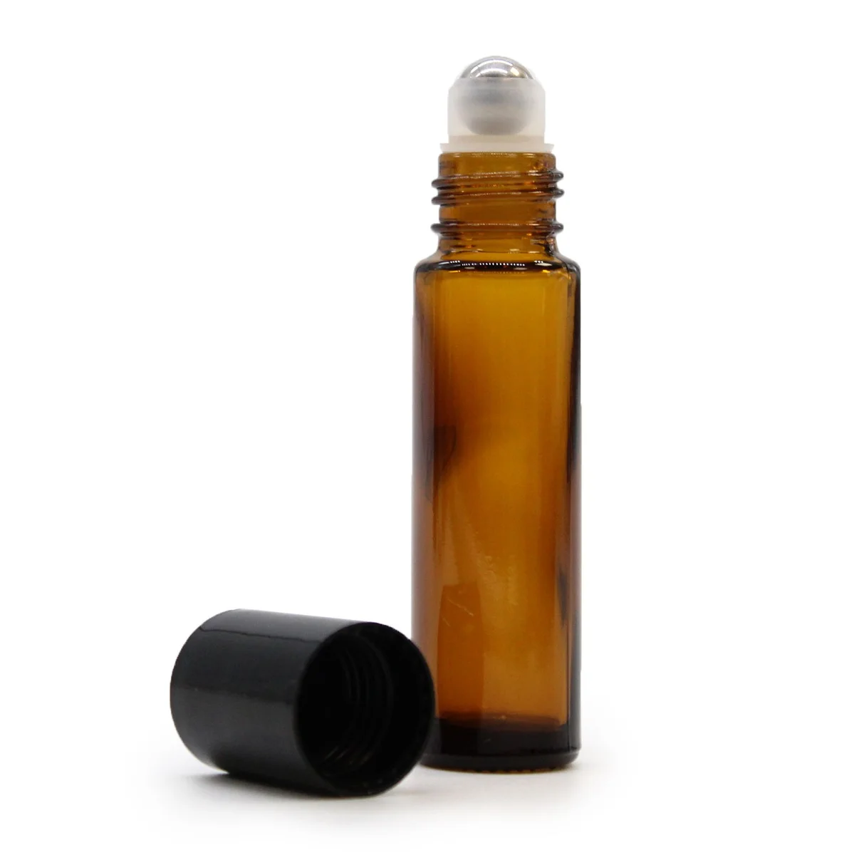10ml amber roller bottle positioned on a plain background