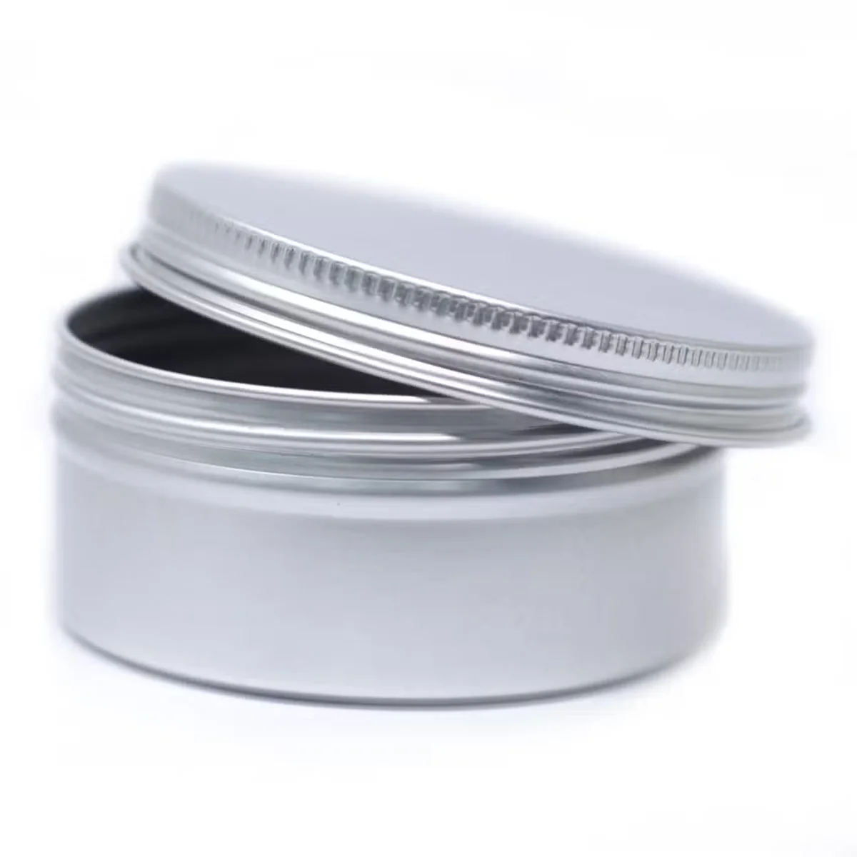 Aluminium circular tin container with screw top, 70x35mm.