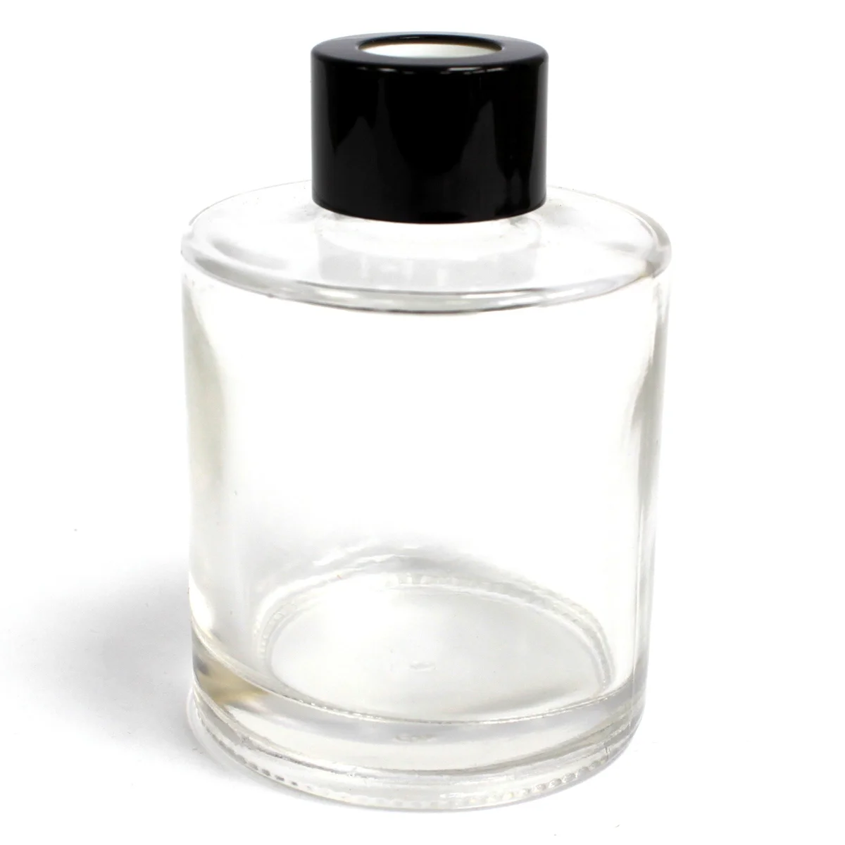 Round clear diffuser bottle showing a 150ml label, glass container with cork top, displayed on a plain background.