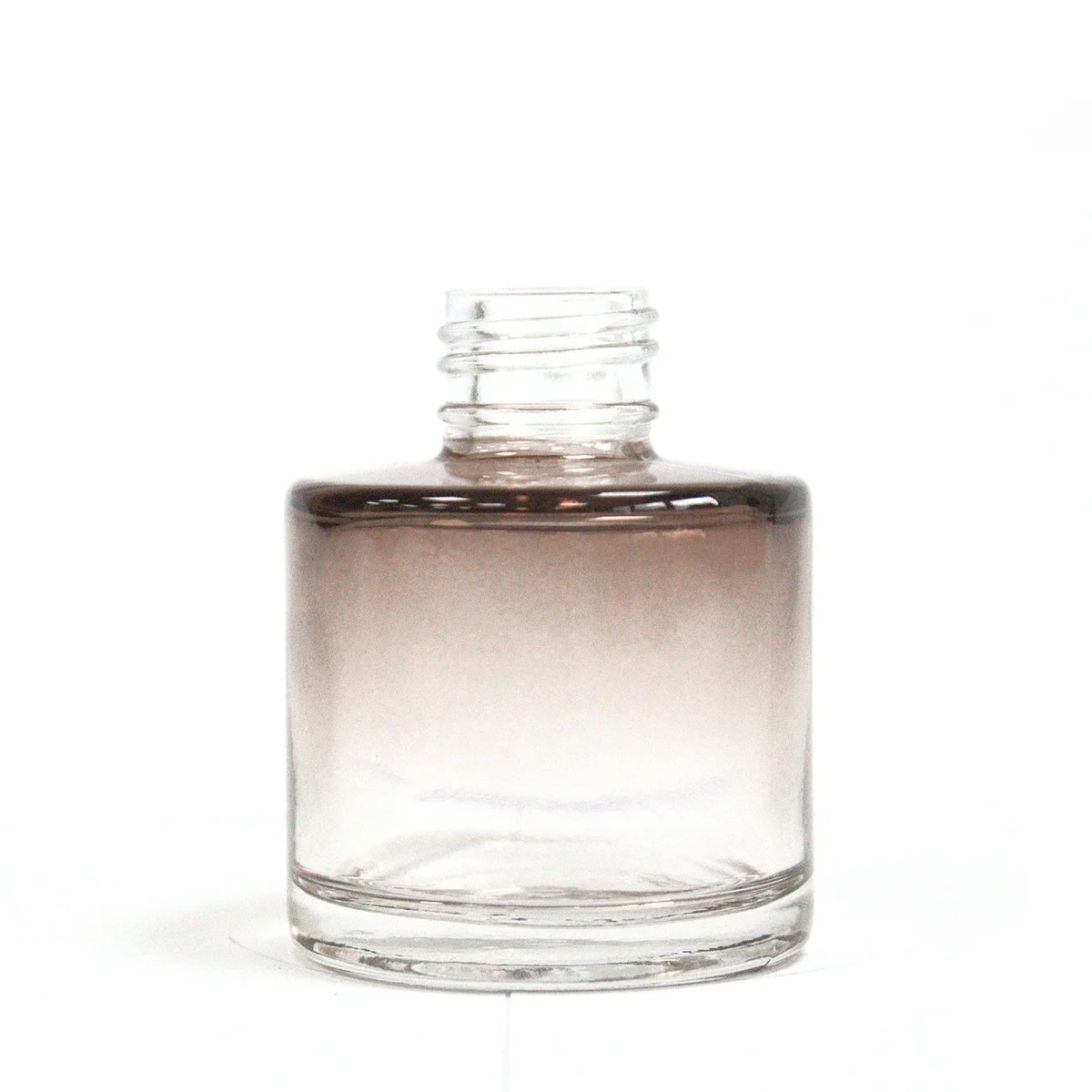 50 ml round reed diffuser bottle in charcoal colour with a smooth, rounded shape and narrow neck
