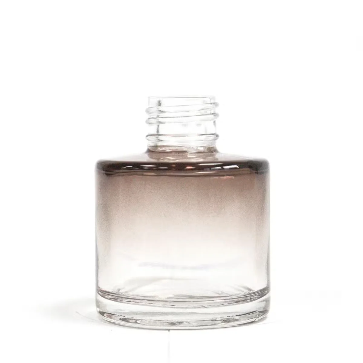 50 ml round charcoal reed diffuser container with a narrow neck for holding diffuser reeds on a white background