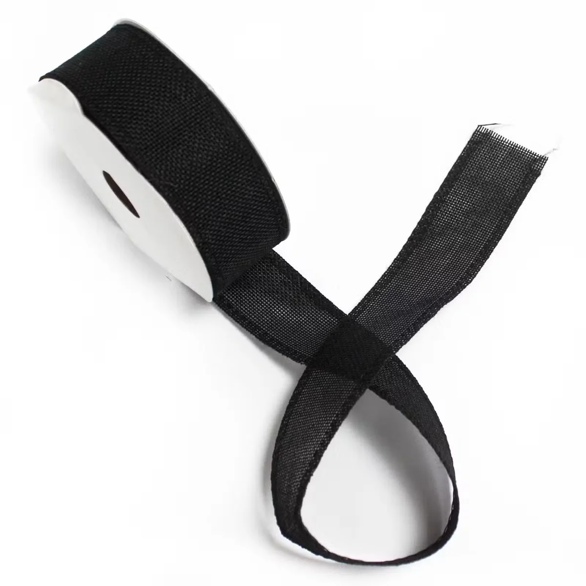 Roll of 20m black ribbon with natural texture, 38mm wide, neatly coiled on a white background
