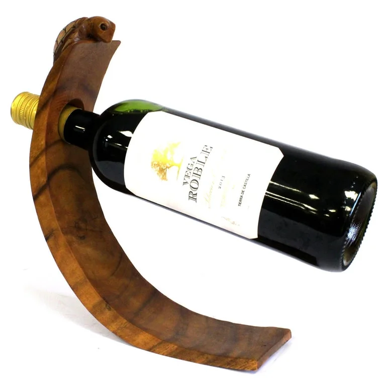 Turtle wine holder from Balance collection, shaped like a turtle, holding a wine bottle.