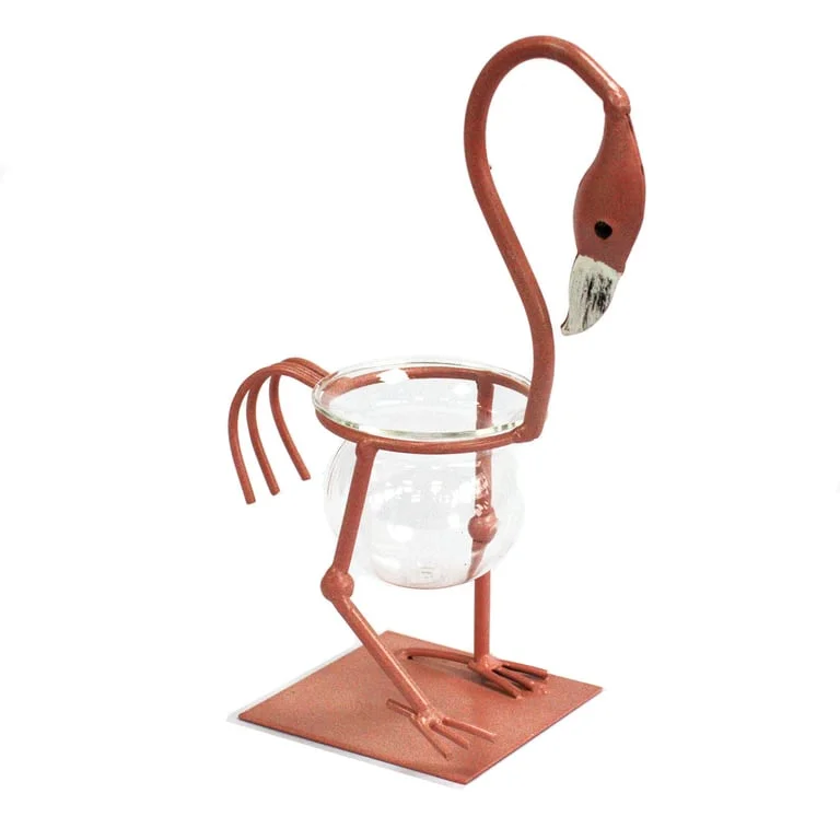 Pink metal flamingo figurine with detailed metal finish, standing on a small surface for hydroponic home décor.