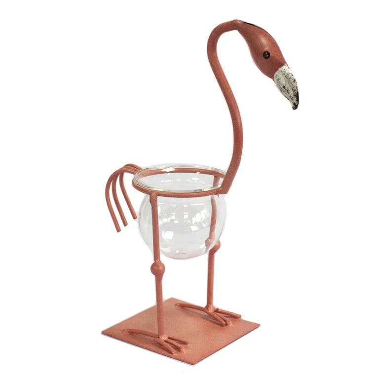 Pink metal flamingo figurine standing upright, depicted on a plant pot base, featuring decorative detailing